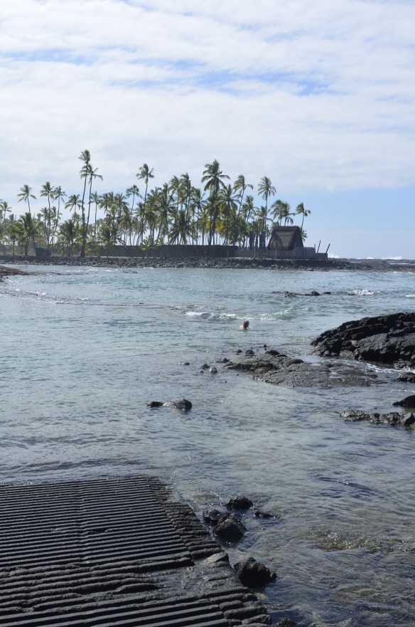 View of Hanaunau from Two-Step. You can see the restored heiau on the point.