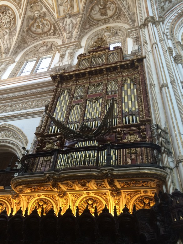 Pipe organ in the choir section, La Mezquita, Cordoba. A matching organ sits on the wall opposite. The position of the pipes is very unusual.
