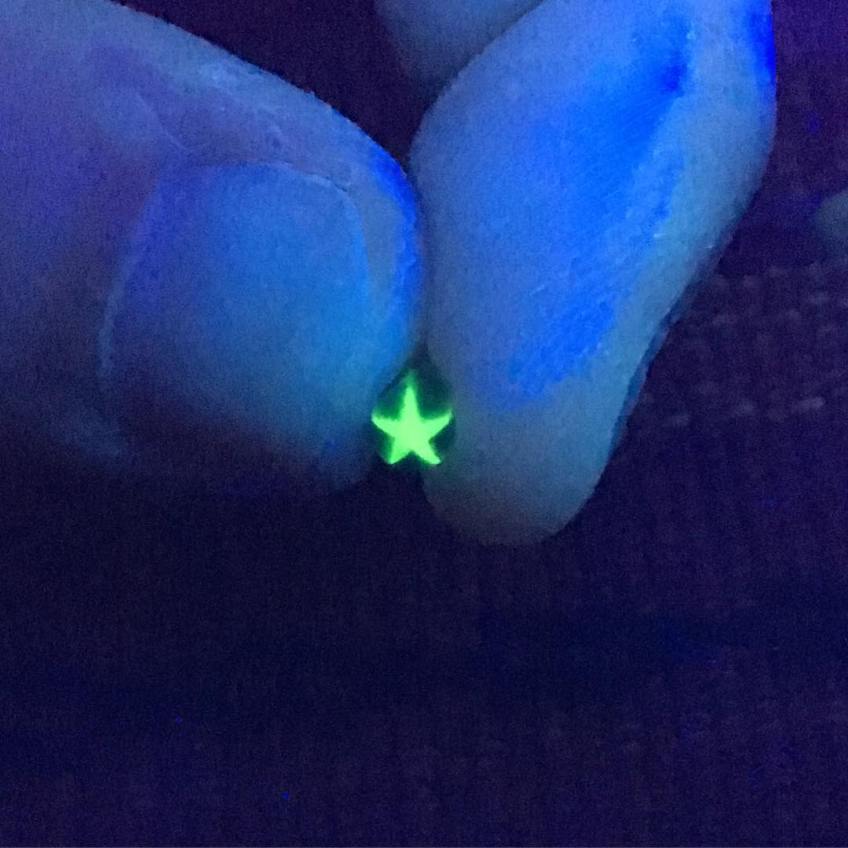 Sea glass millefiori rod with UV star.